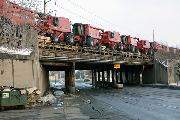Train hauling Case combines, South Bend