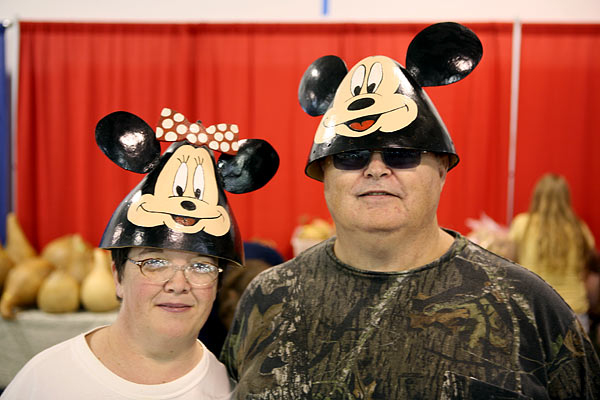 Couple wearing Mickey Mouse hats, Indiana Gourd Society show, Kokomo