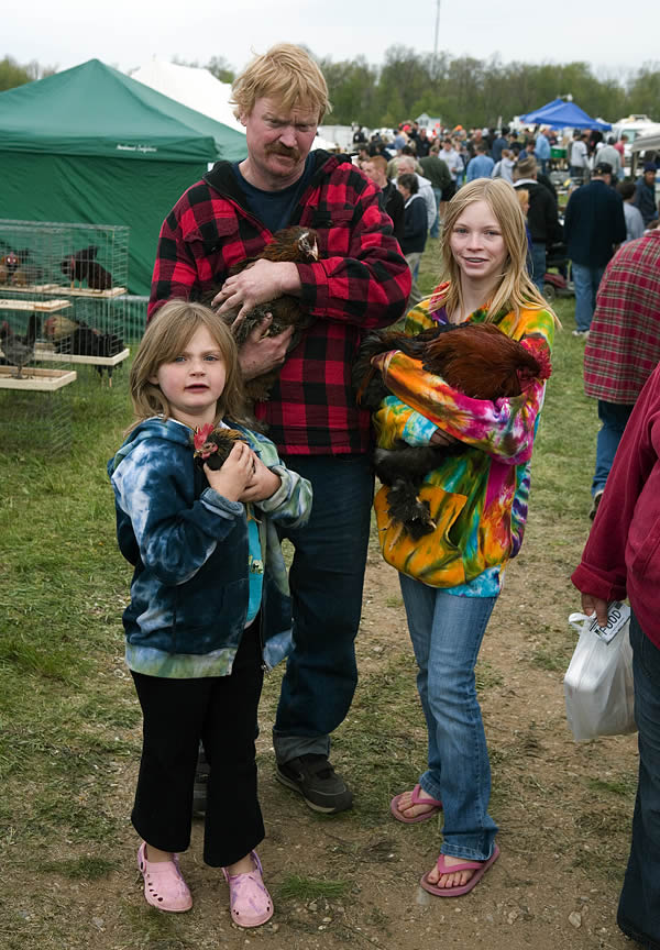 Family with chickens, Animal Swap Meet, Ligonier