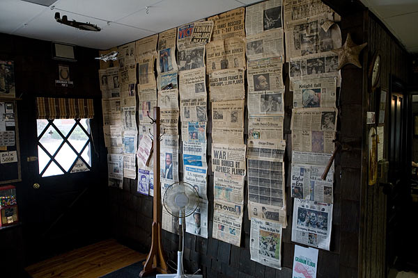 Wall of newspapers, Myron's Barber Shop, Knox