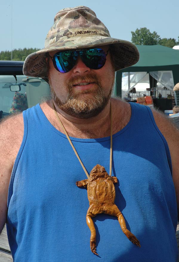 Man wearing a frog necklace, Animal Swap Meet, Ligonier